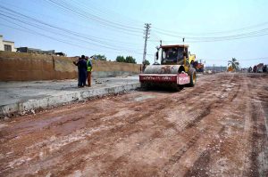 Labourers are busy in construction work of Kabutar Chowk underpass during development work in the city.