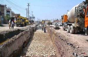 Laborers are engaged in the construction of an underpass at Phandu Chowk on Ring Road, where work is progressing to improve traffic flow and urban infrastructure in the provincial capital.