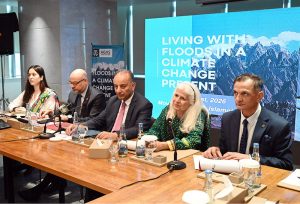 Federal Minister for Climate Change and Environmental Coordination Dr. Musadik Malik delivers the keynote address at an event titled “Living with Floods in a Climate Change Present,” organized by the AGHS Legal Aid Cell