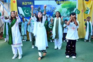 Students perform a folk dance to a national song during a programme at the Royal School System in connection with Pakistan’s 79th Independence Day celebrations.
