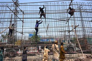 Laborers are engaged in the construction of an underpass at Phandu Chowk on Ring Road, where work is progressing to improve traffic flow and urban infrastructure in the provincial capital.