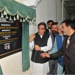 Federal Minister for Railways Muhammad Hanif Abbasi unveils the inauguration plaque of the Control Room of Multan Division under the Railway Advanced Infrastructure Network (RAIN) project at Multan Railway Station