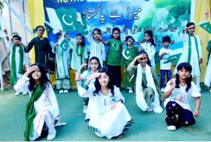 Students perform a folk dance to a national song during a programme at the Royal School System in connection with Pakistan’s 79th Independence Day celebrations.