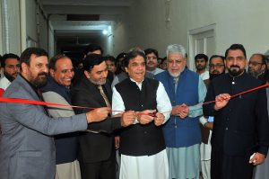 Federal Minister for Railways Muhammad Hanif Abbasi unveils the inauguration plaque of the Control Room of Multan Division under the Railway Advanced Infrastructure Network (RAIN) project at Multan Railway Station