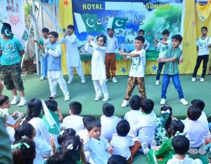 Students perform a folk dance to a national song during a programme at the Royal School System in connection with Pakistan’s 79th Independence Day celebrations.