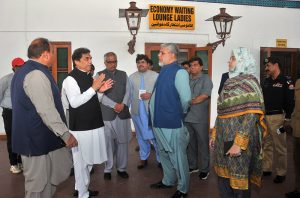 Federal Minister for Railways Muhammad Hanif Abbasi talks to senior railway officials during an inspection visit to the passenger facility areas, including the Economy Waiting Lounge for Ladies, at Multan Railway Station