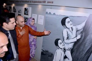 Commissioner Faisalabad Dr. Imran Hamid Sheikh visits a photo exhibition titled “Navigating Borders” after its inauguration at Lyallpur Museum