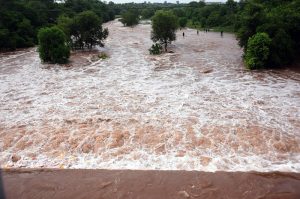 Spillway gates of Rawal Dam open to discharge floodwater following a heavy spell of monsoon rain in the Federal Capital