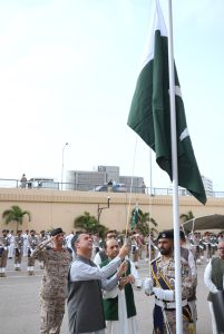 Federal Minister for Maritime Affairs Muhammad Junaid Anwar Chaudhry hoisting the national flag at Karachi Port Trust to mark 79th Independence Day