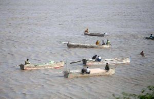 Fishermen catching the fish after water level in the Indus River is continuously rising due to the rains across the country.