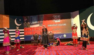 Students present a tableau during a ceremony organized at the Sargodha Arts Council to commemorate Youm-e-Istehsal Kashmir and express solidarity with Kashmiri people of Indian Illegally Occupied Jammu and Kashmir (IIOJK).