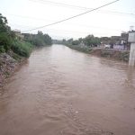 A view of the rising water level in Nullah Lai following heavy rainfall in the City