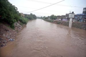 A view of the rising water level in Nullah Lai following heavy rainfall in the City