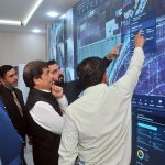 Federal Minister for Railways Muhammad Hanif Abbasi receives a briefing on real-time train tracking and operational monitoring systems inside the newly inaugurated Control Room - Multan Division under the RAIN project at Multan Railway Station