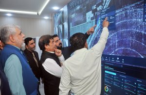 Federal Minister for Railways Muhammad Hanif Abbasi receives a briefing on real-time train tracking and operational monitoring systems inside the newly inaugurated Control Room - Multan Division under the RAIN project at Multan Railway Station