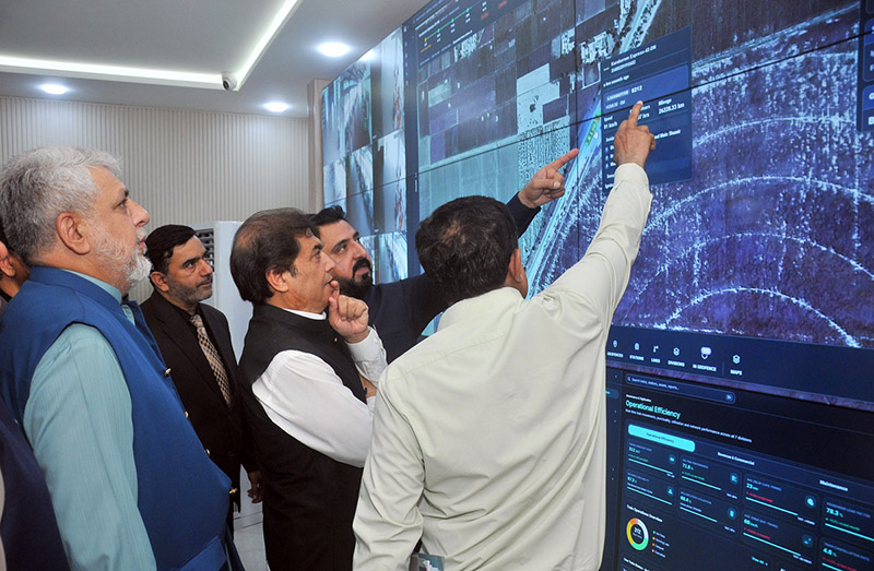 Federal Minister for Railways Muhammad Hanif Abbasi receives a briefing on real-time train tracking and operational monitoring systems inside the newly inaugurated Control Room - Multan Division under the RAIN project at Multan Railway Station