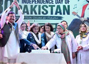 Vice Chancellor of Shaheed Mohtarma Benazir Bhutto Medical University Professor Dr. Nusrat Shah and others cutting the cake during celebrations of Pakistan’s 79th Independence Day at CMC College