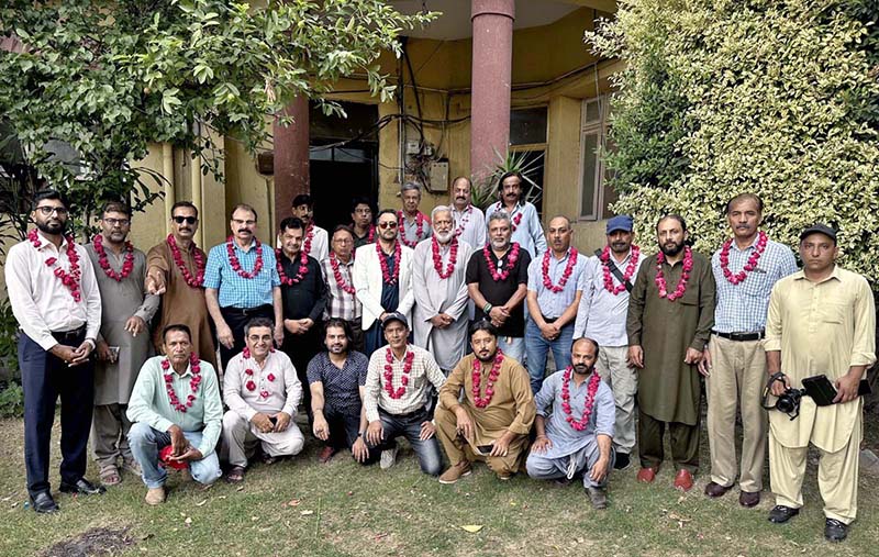 Newly elected office-bearers of the Rawalpindi-Islamabad Photojournalists Association (RIPJA), led by President Sajjad Haider, pose for a group photograph after being elected unopposed in the annual elections 2026-27 at Press Club