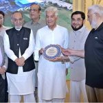 Chairman Sialkot Medical City Khawaja Masood Akhtar presenting a sheild to Defense Minister Khawaja Muhammad Asif