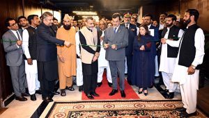 Chairman Senate, Syed Yousuf Raza Gilani, cuts the ribbon to inaugurate the newly constructed and renovated Senate offices at Parliament House.