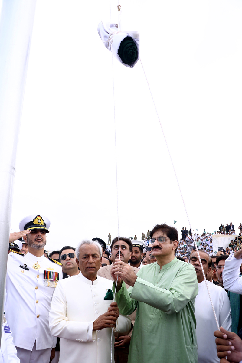 Governor Sindh, Syed Muhammad Nehal Hashmi, Sindh Chief Minister Syed Murad Ali Shah accompanied by his cabinet members hoist the National Flag at the Mazar-e-Quaid during Independence Day of Pakistan celebrations