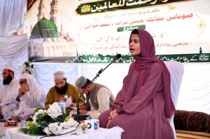 A female Naat Khuwan recites a Naat during a Seerat-un-Nabi (PBUH) Naat Khwani and Qiraat competition organized in connection with Rabi-ul-Awwal at Eidgah.