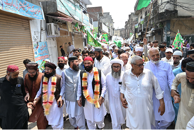 A large number of people participate in a rally celebrating the 12th Rabi-ul-Awwal, Eid Milad-un-Nabi (the birth anniversary of Prophet Muhammad ﷺ)