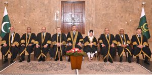 Chief Justice of Pakistan and Judges of the Supreme Court of Pakistan presenting the bouquet to Justice Musrat Hilali on eve of laying the robes of office at the Supreme Court.
