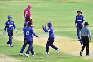 Players celebrate after taking a wicket during the National Champions Cup 2026–27 match between Pakistan Blues and Pakistan Gold at Multan Cricket Stadium