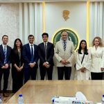 Federal Minister for Planning, Development and Special Initiatives Ahsan Iqbal in a group photo with a visiting delegation of Harvard Business School MBA students at the Ministry of Planning