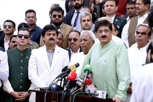 Governor Sindh, Syed Muhammad Nehal Hashmi, talking to the media persons along with Sindh Chief Minister Syed Murad Ali Shah accompanied by his cabinet members after laying the floral wreath on the grave of Quaid-e-Azam Muhammad Ali Jinnah to mark Independence Day celebrations at Mazar-e-Quaid
