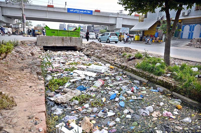 A canal near 47 Pull is choked with garbage, posing health and environmental hazards and highlighting the need for immediate cleaning