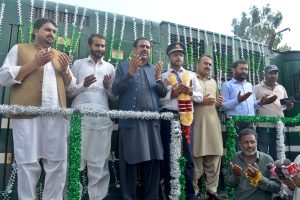 Chairman Zakat and Ushr Rana Munawar Ghaus leads a prayer as the Sandal Express prepares to depart from Sargodha for Multan following its restoration after six years.