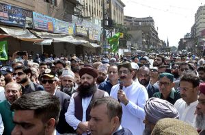 Sindh Chief Minister Syed Murad Ali Shah addressing during participating in Eid Milad-un-Nabi (PBUH) Main procession at Memon Masjid. Governor Sindh Mohammad Nihal Hashmi, Provincial Ministers Saeed Ghani, Zia-ul-Hassan Lanjar and Riaz Hussain Shah Shirazi, Mayor Karachi Murtaza Wahab, Dr Farooq Sattar, and other dignitaries stand alongside him during the procession
