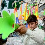 A vendor display and sells pressure horns along the roadside at Saddar market despite a ban imposed by the authorities during the Independence Day celebrations