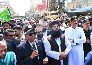 Sindh Chief Minister Syed Murad Ali Shah addressing during participating in Eid Milad-un-Nabi (PBUH) Main procession at Memon Masjid. Governor Sindh Mohammad Nihal Hashmi, Provincial Ministers Saeed Ghani, Zia-ul-Hassan Lanjar and Riaz Hussain Shah Shirazi, Mayor Karachi Murtaza Wahab, Dr Farooq Sattar, and other dignitaries stand alongside him during the procession