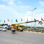 Workers hoist flags ahead of celebrations marking the Makkah Joint Defence Agreement, signed by Pakistan, Saudi Arabia, and Türkiye on August 7, 2026, at Al-Safa Palace in Makkah