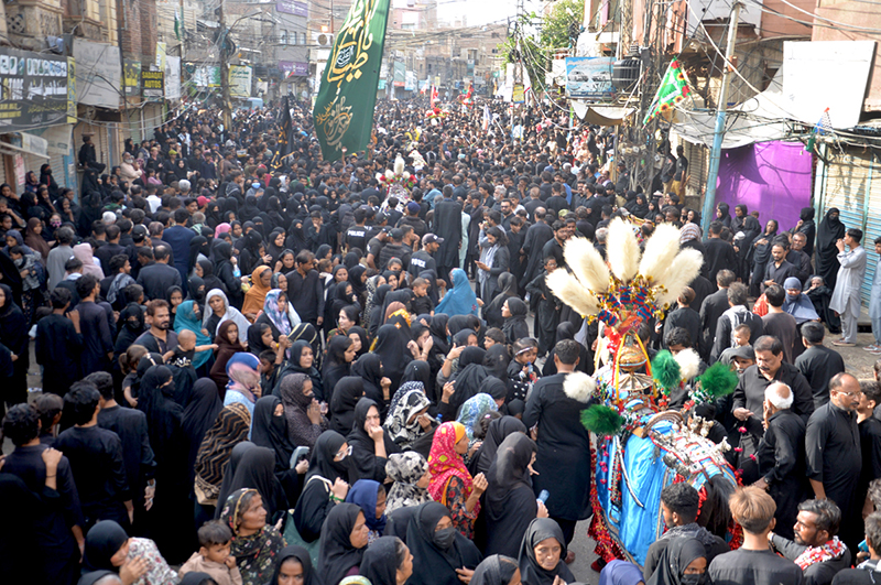 A large number of mourners attending the procession of 'Chup Tazia' outside Qadamgah Moula Ali