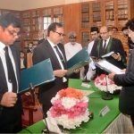 Chief Justice of the Sindh High Court Mr. Justice Zafar Ahmed Rajput administers the oath to three newly appointed Additional Judges during a ceremony at the Sindh High Court Committee Room
