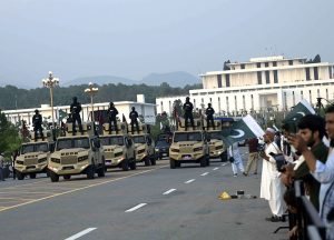 A platoon of commandos takes part in the march-past during the full-dress rehearsal for Pakistan’s 79th Independence Day celebrations at D-Chowk in the federal capital.