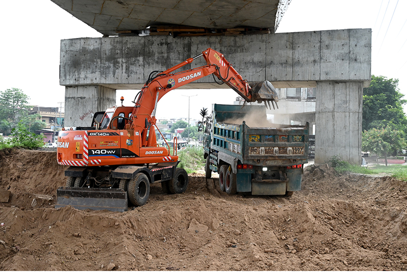 Heavy machinery is being used for the construction of a flyover along the under-construction 10th Avenue as part of ongoing development work in the Federal Capital