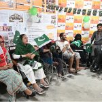 Persons with disabilities perform national songs during the Independence Day commemoration of Pakistan organized by the DIA Welfare Association