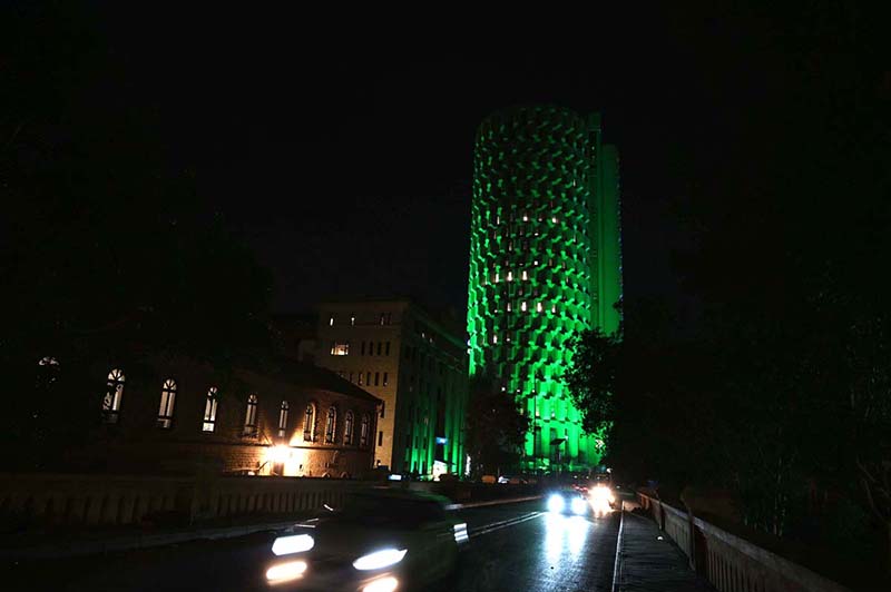 An illuminated view of Habib Bank Plaza decorated with lights in connection with upcoming Independence Day celebrations