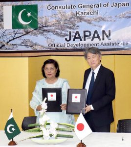 Consul General of Japan in Karachi, HATTORI Masaru, and Ms. Habiba Habib, President of the Institute of Behavioral Psychology (IBP) School of Special Education during a signing ceremony at the Consulate-General of Japan. Japan Provides Grant Assistance to a Local NGO for a Transportation Project.