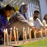 Civil society members hold a candlelight vigil outside the nursery of the Children’s Hospital at Pakistan Institute of Medical Sciences (PIMS), where 14 newborns lost their lives in a fire incident a day earlier