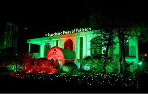 The building of the Associated Press of Pakistan (APP) is illuminated in green and red lights on the eve of celebrations marking the Makkah Joint Defence Agreement, signed by Pakistan, Saudi Arabia, and Türkiye on August 7, 2026, at Al-Safa Palace in Makkah
