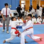 Young karate players compete during the Pakistan Independence Celebrations U-14 Kids Sports Gala organized by the Sports Department at the Sports Gymnasium