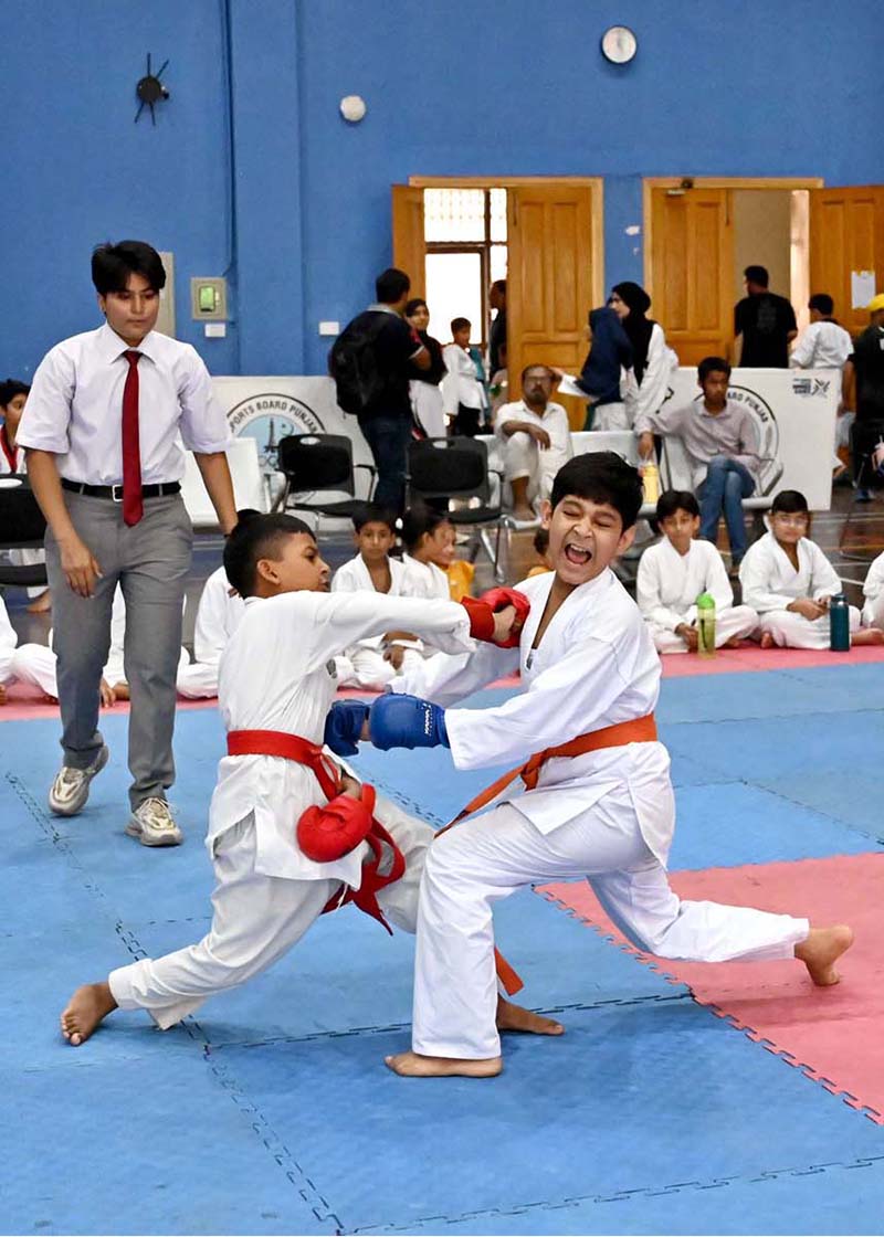 Young karate players compete during the Pakistan Independence Celebrations U-14 Kids Sports Gala organized by the Sports Department at the Sports Gymnasium