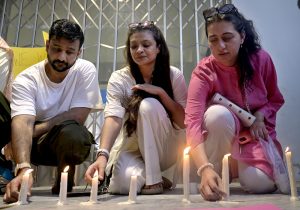 Civil society members hold a candlelight vigil outside the nursery of the Children’s Hospital at Pakistan Institute of Medical Sciences (PIMS), where 14 newborns lost their lives in a fire incident a day earlier