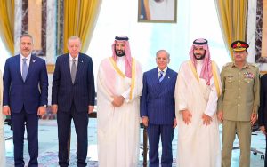 Pakistan's Prime Minister Shehbaz Sharif, Saudi Crown Prince and Prime Minister Mohammed bin Salman, and Turkish President Recep Tayyip Erdoğan pose after the signing of the Makkah Joint Defence Agreement.
